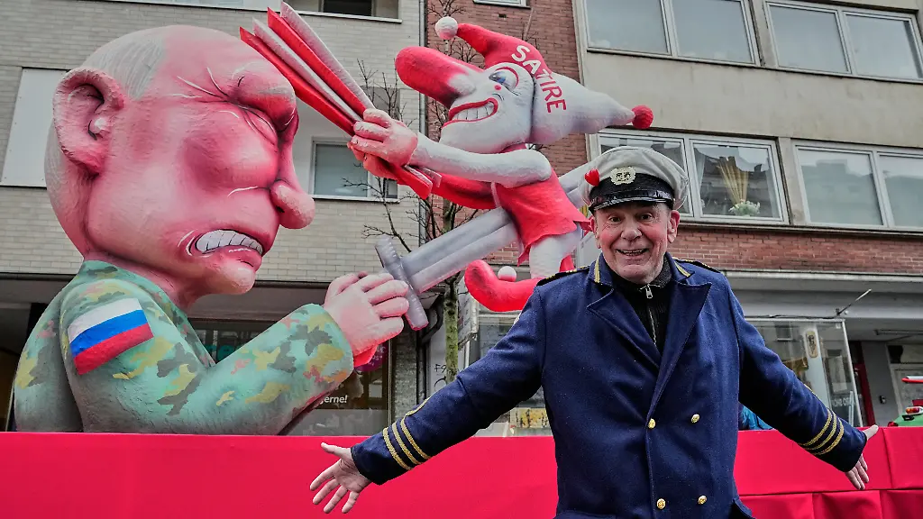 Germany-s-most-famous-carnival-sculptor-Jaques-Tilly-who-faces-criminal-proceedings-in-Russia-because-of-his-satirical-work-stands-at-his-brand-new-carnival-float-depicting-Russian-President-Vladimir-Putin-ahead-of-the-Rosemonday-Carnival-Parade-in-Duesseldorf-Germany-Monday-Feb