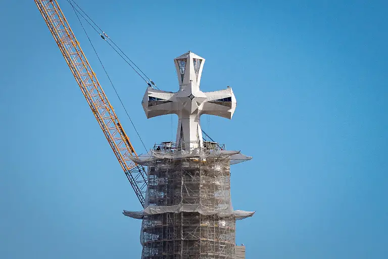 The-cross-crowning-the-central-Tower-of-Jesus-Christ-at-Sagrada-Familia-is-seen-above-the-skyline-of-Barcelona-Spain-on-March-9-2026-The-installation-of-the-final-elements-of-the-cross-marks-the-completion-of-the-tower-designed-by-Antoni-Gaudi-bringing-the-basilica-to-its-final-height-of-172-5-meters-and-making-it-the-tallest-church-in-the-world