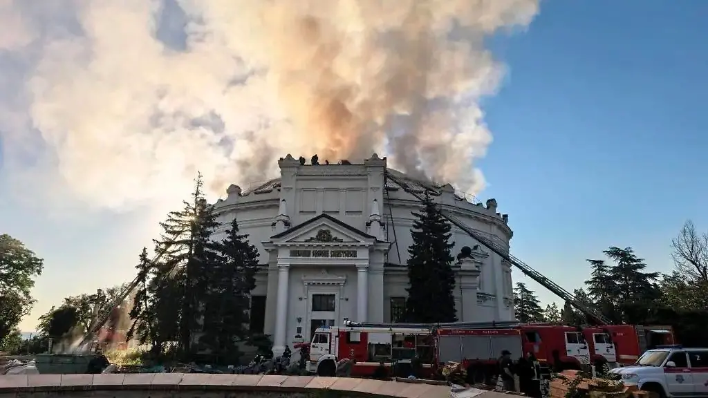 In-this-photo-provided-by-Sevastopol-mayor-Mikhail-Razvozhaev-telegram-channel-on-Wednesday-June-10-2026-Firefighters-put-out-a-fire-after-a-Ukrainian-drone-attack-hit-the-building-of-Defense-of-Sevastopol-1854-1855-Panorama-in-Sevastopol-Crimea