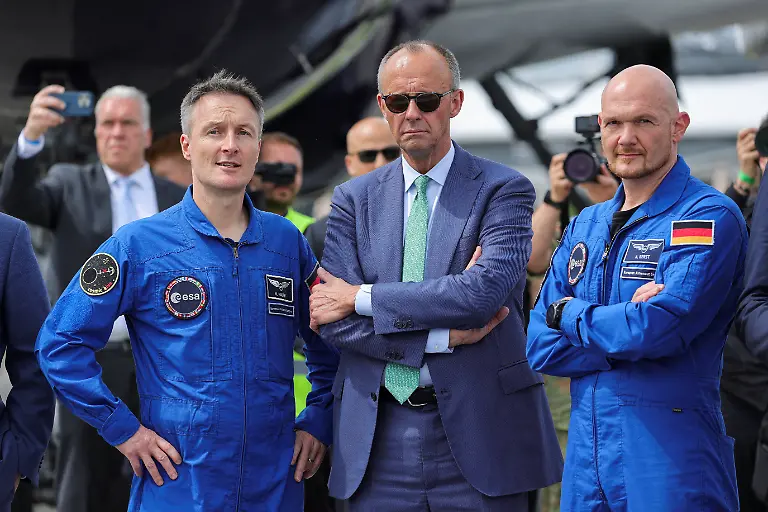 German-Chancellor-Friedrich-Merz-poses-with-European-Space-Agency-ESA-German-astrounauts-Alexander-Gerster-and-Matthias-Maurer-during-the-International-Aerospace-Exhibition-ILA-on-the-opening-day-at-Schoenefeld-Airport-in-Berlin-Germany-June-10-2026