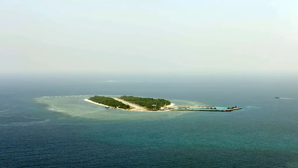 epa05421599-A-handout-photo-provided-by-the-Office-of-the-President-of-Taiwan-on-12-July-2016-shows-an-aerial-photograph-of-Taiping-Island-also-known-as-Itu-Aba-Island-in-the-South-China-Sea-23-March-2016-The-international-tribunal-in-The-Hague-issued-its-ruling-on-12-July-2016-that-China-has-no-legal-basis-for-its-nine-dash-line-claiming-most-part-of-the-South-China-Sea
