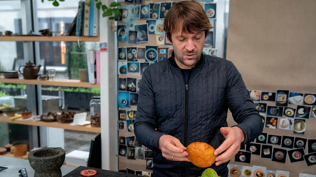 Noma-s-chef-Rene-Redzepi-prepares-a-vegetarian-burger-in-a-restaurant-in-Copenhagen-Nov-24-2024