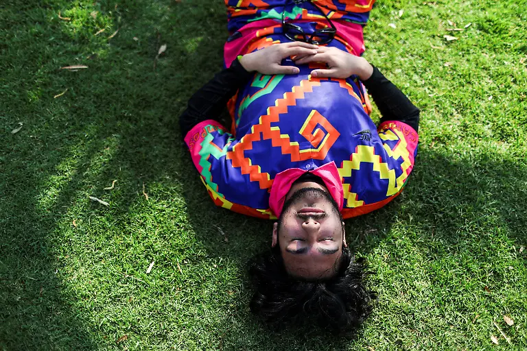 Emiliano-Macedo-21-wearing-a-uniform-inspired-by-former-Mexican-goalkeeper-Jorge-Campos-Navarrete-rests-during-a-break-in-an-amateur-match-between-Mexico-and-Argentina-in-the-protected-Xochimilco-area-in-southern-Mexico-City-Mexico-March-8-2026-The-UNESCO-World-Heritage-site-known-for-its-canals-and-chinampas-or-so-called-floating-gardens-remains-a-social-hub-where-residents-gather-for-weekend-football-matches-REUTERS-Raquel-Cunha-SEARCH-CUNHA-MEXICO-SOCCER-FOR-THIS-STORY-SEARCH-WIDER-IMAGE-FOR-ALL-STORIES