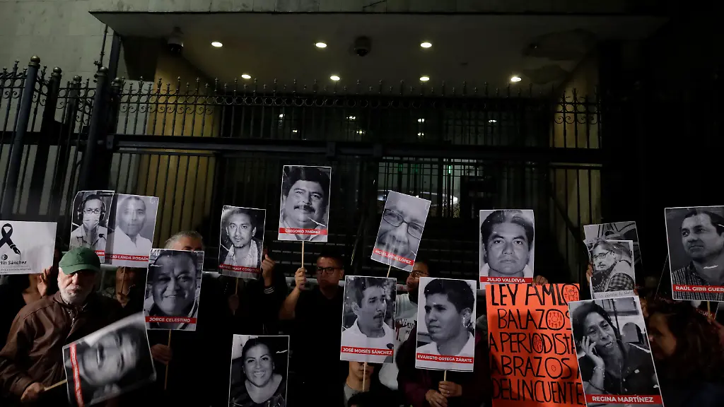 Journalists-protest-with-photographs-outside-the-Ministry-of-the-Interior-in-Mexico-City-to-demand-justice-for-the-disappearance-and-murder-of-their-colleagues-in-Mexico-Recently-Luis-Martin-Sanchez-Iniguez-who-worked-as-a-correspondent-for-La-Jornada-in-the-city-of-Tepic-Nayarit-had-been-missing-since-5-July-and-on-8-July-authorities-found-his-lifeless-body-with-a-message-written-on-a-poster-board-saying-You-can-publish-whatever-you-want-except-mess-with-the-family-On-the-other-hand-Juan-Carlos-Hinojosa-Viveros-who-worked-as-a-photojournalist-and-editor-of-the-portal-La-de-8-News-disappeared-shortly-after-19-30-hours-on-Thursday-6-July-in-the-municipality-of-Nanchital-in-the-south-of-the-state-of-Veracruz-the-causes-of-this-event-being-unknown
