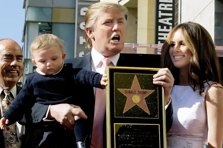 FILE-Donald-Trump-the-billionaire-developer-and-producer-of-NBC-s-The-Apprentice-with-his-wife-Melania-Knauss-and-their-son-Barron-pose-for-a-photo-after-he-was-honored-with-a-star-on-the-Hollywood-Walk-of-Fame-in-Los-Angeles-Jan-16-2007