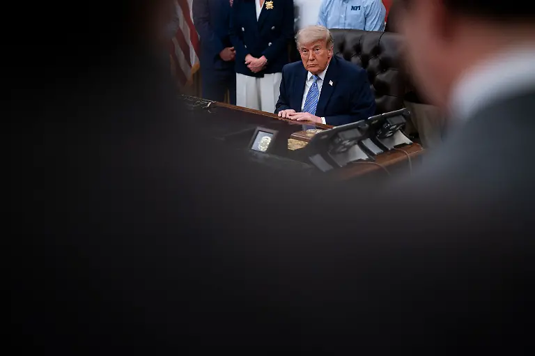 WASHINGTON-DC-MAY-21-U-S-President-Donald-Trump-listens-to-a-question-from-a-member-of-the-media-at-an-event-with-Environmental-Protection-Agency-EPA-Administrator-Lee-Zeldin-on-May-21-2026-in-the-Oval-Office-at-the-White-House-in-Washington-D-C-Trump-said-he-would-rescind-Biden-era-regulations-on-refrigerators-and-air-conditioners