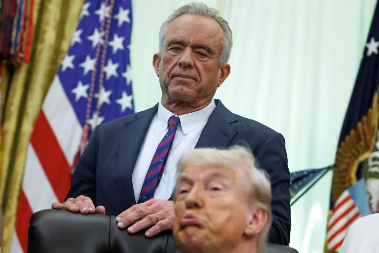 United-States-Secretary-of-Health-and-Human-Services-Robert-F-Kennedy-Jr-speaks-behind-US-President-Donald-J-Trump-ahead-of-a-proclamation-signing-in-the-Oval-Office-of-the-White-House-in-Washington-DC-USA-on-May-5-2026-The-memorandum-is-set-to-restore-the-Presidential-Fitness-Test-Award-a-competitive-school-based-fitness-program-last-seen-under-the-Obama-administration