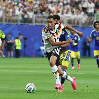 im-Zweikampf-Aktion-mit-Jamal-Musiala-10-Deutschland-Deutschland-vs-Curacao-Fussball-Weltmeisterschaft-2026-Gruppenphase-14-06