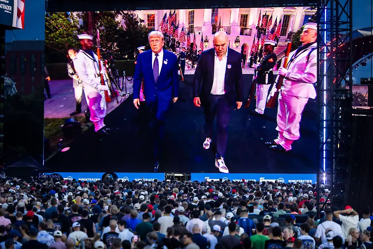 UFC-Freedom-250-fan-fest-on-the-Ellipse-US-President-Donald-Trump-L-and-Ultimate-Fighting-Championship-President-and-CEO-Dana-White-R-walk-toward-the-octagon-for-the-UFC-Freedom-250-event-from-the-Ellipse-outside-the-South-Lawn-of-the-White-House-in-Washington-DC-USA-14-June-2026-The-mixed-martial-arts-event-is-taking-place-on-the-80th-birthday-of-President-Trump