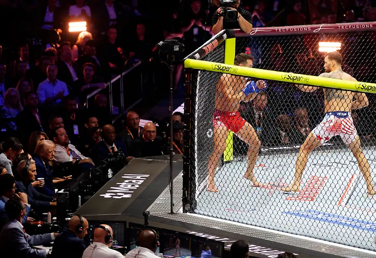Freedom-250-UFC-Fights-at-the-White-House-in-Washington-UFC-Lightweights-Mauricio-Ruffy-and-Michael-Chandler-battle-during-the-Freedom-250-UFC-fight-card-on-the-South-Lawn-of-the-White-House-in-Washington-DC-on-Sunday-June-14-2026-The-mixed-martial-arts-bouts-are-being-held-as-part-of-President-Trump-s-80th-birthday-weekend-activities-Photo-by-Bonnie-Cash-Pool-ABACAPRESS