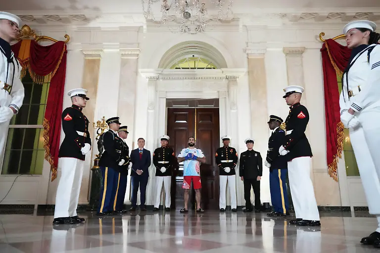UFC-Freeform-250-Trump-Aiemann-Zahabi-walks-through-the-White-House-before-his-bantamweight-bout-with-Sean-O-Malley-not-pictured-during-UFC-Freedom-250-on-the-South-Lawn-of-the-White-House-Sunday-June-14-2026-in-Washington