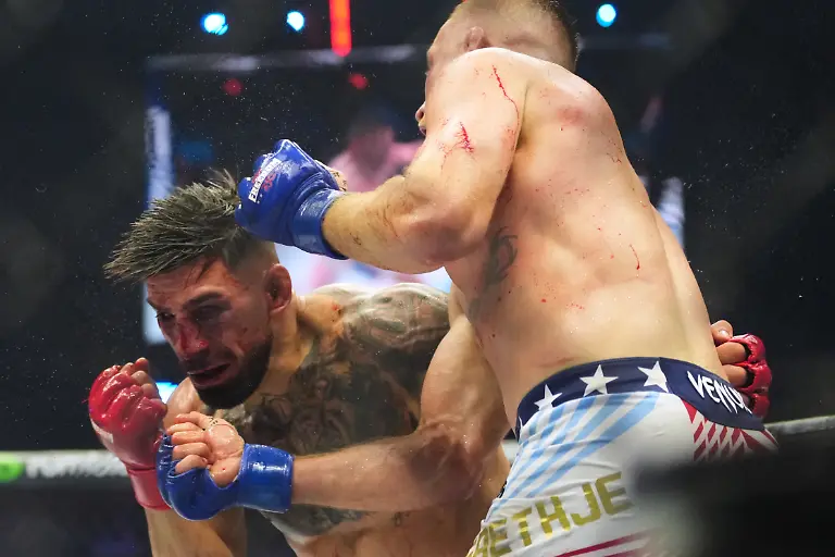 Ilia-Toupruia-left-fights-Justin-Gaethje-during-UFC-Freedom-250-on-the-South-Lawn-of-the-White-House-Monday-June-15-2026-in-Washington