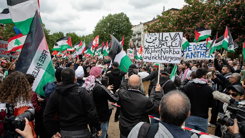 May-16-2026-Berlin-Berlin-Germany-Police-officers-detain-demonstrators-during-a-Nakba-Day-protest-in-Berlin-Kreuzberg-Germany-on-May-16-2026-Around-2-000-people-joined-the-march-from-Oranienplatz-to-Suedstern-as-tensions-flared-between-protesters-and-police-leading-to-multiple-arrests-according-to-authorities-Berlin-police-said-14-people-were-detained-over-alleged-offenses-including-attacks-on-officers-and-the-use-of-symbols-linked-to-unconstitutional-organizations-The-demonstration-was-monitored-by-around-700-police-officers-following-violent-clashes-at-similar-protests-in-previous-years