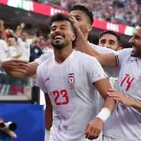 Ramin-Rezaeian-L-and-Saman-Ghoddos-R-of-Iran-celebrate-a-goal-during-a-Group-G-match-of-the-2026-FIFA-World-Cup-between-Iran-and-New-Zealand-at-SoFi-Stadium-in-Los-Angeles-USA-15-June-2026