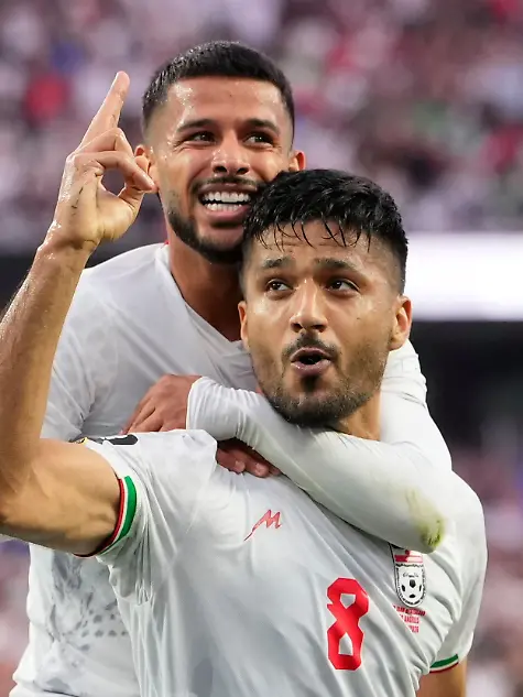 Iran-s-Mohammad-Mohebbi-8-celebrates-after-scoring-his-side-s-second-goal-alongside-Mehdi-Ghayedi-10-during-the-World-Cup-Group-G-soccer-match-between-Iran-and-New-Zealand-in-Inglewood-Calif-near-Los-Angeles-Monday-June-15-2026-AP-Photo-Mark-J