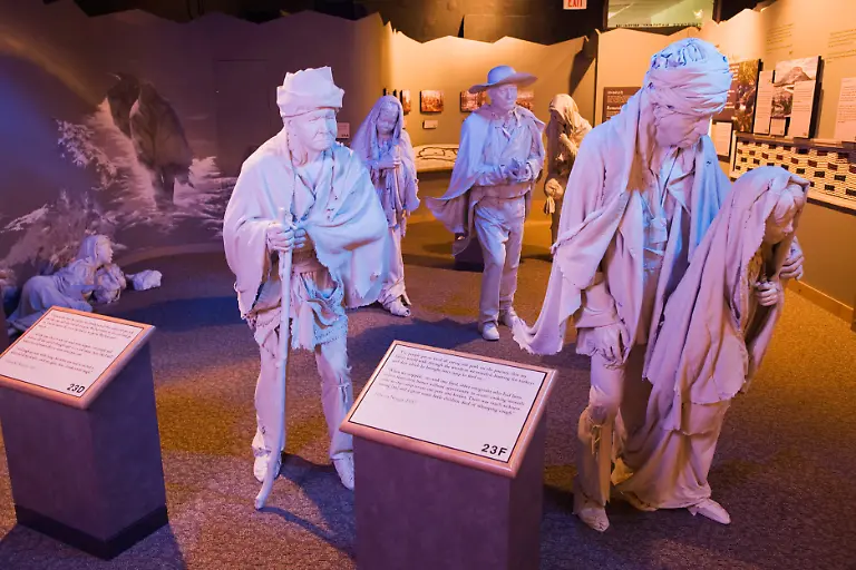 RECORD-DATE-NOT-STATED-Cherokee-Hills-Byway-Trail-of-Tears-Exhibit-at-the-Cherokee-National-Museum-With-help-from-the-National-Parks-Services-the-Cherokee-Heritage-Center-permanently-houses-an-exhibit-that-explores-the-forced-removal-of-the-Cherokee-people-from-their-indigenous-territory-to-the-Indian-Territory-present-day-Oklahoma-The-sculptures-create-an-environment-where-the-visitor-walks-alongside-the-Cherokees-on-their-route-from-their-homelands-to-the-Indian-Territory-The-nine-figures-represent-the-variety-of-lifestyles-and-people-that-made-this-historic-trek-The-experience-of-being-in-the-moment-along-side-the-Cherokee-leaves-an-immeasurable-effect-on-our-visitors-emotional-understanding-of-the-Trail-of-Tears