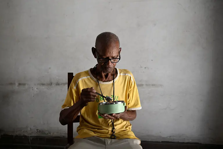 Sagrado-Armando-Garcia-85-a-retired-government-bureaucrat-eats-lunch-at-home-in-Havana-Cuba-April-28-2026-Cuba-has-struggled-for-years-under-U-S-sanctions-to-provide-basic-services-Garcia-said-he-has-faced-worsening-shortages-of-food-in-recent-months-leaving-him-at-times-dizzy-with-hunger-They-are-leaving-us-to-our-fate-he-said-REUTERS-Norlys-Perez-SEARCH-NORLYS-CUBA-ELDERLY-FOR-THIS-STORY-SEARCH-WIDER-IMAGE-FOR-ALL-STORIES