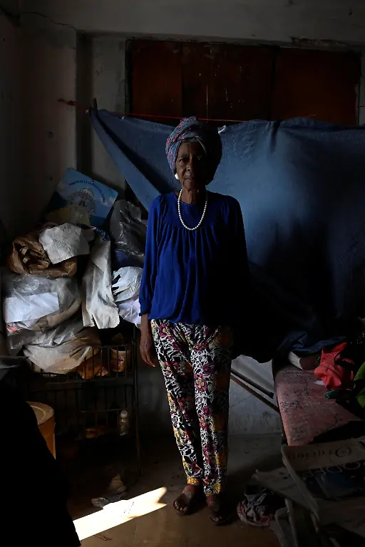Regina-Zaida-Jorge-74-a-pensioner-who-lives-alone-and-relies-on-church-groups-for-food-poses-in-her-home-in-Havana-Cuba-April-29-2026-Jorge-said-she-has-no-running-water-in-her-apartment-and-must-carry-it-from-a-rooftop-cistern-each-day-The-pension-isn-t-enough-for-anything-she-said-REUTERS-Norlys-Perez-TPX-IMAGES-OF-THE-DAY-SEARCH-NORLYS-CUBA-ELDERLY-FOR-THIS-STORY-SEARCH-WIDER-IMAGE-FOR-ALL-STORIES
