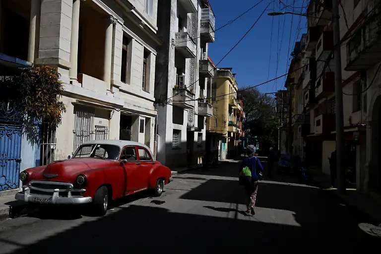 Regina-Zaida-Jorge-74-a-pensioner-who-lives-alone-and-relies-on-church-groups-for-food-walks-across-a-street-near-her-home-in-Havana-Cuba-April-29-2026-Jorge-said-she-survives-on-limited-state-support-as-living-conditions-worsen-The-pension-isn-t-enough-for-anything-she-said-REUTERS-Norlys-Perez-SEARCH-NORLYS-CUBA-ELDERLY-FOR-THIS-STORY-SEARCH-WIDER-IMAGE-FOR-ALL-STORIES