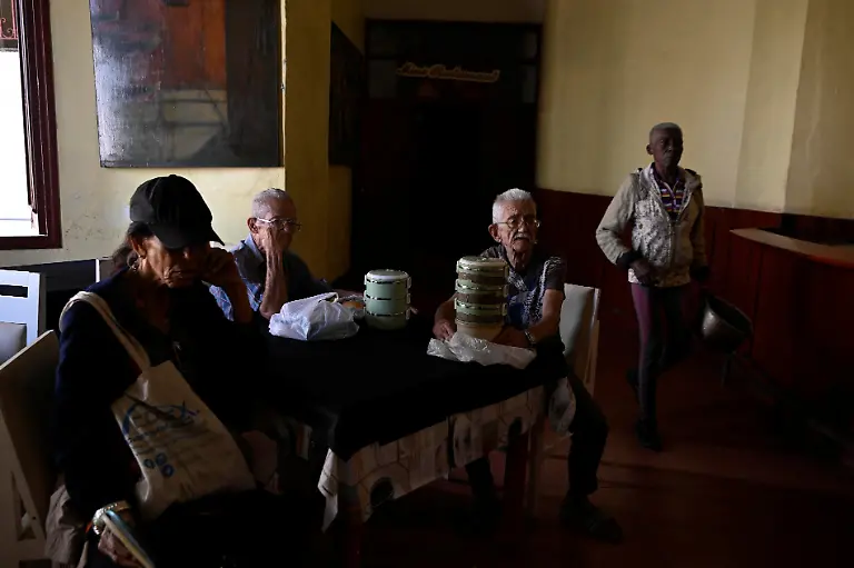 A-group-of-elderly-people-wait-at-a-dining-hall-to-receive-food-assistance-through-the-Sistema-de-Atencion-a-la-Familia-SAF-system-in-Havana-Cuba-March-10-2026-Pensions-in-Cuba-have-shrunk-to-the-equivalent-of-7-a-month-on-the-black-market-exchange-as-the-peso-has-lost-about-a-third-of-its-value-against-the-dollar-since-the-start-of-the-blockade-REUTERS-Norlys-Perez-TPX-IMAGES-OF-THE-DAY-SEARCH-NORLYS-CUBA-ELDERLY-FOR-THIS-STORY-SEARCH-WIDER-IMAGE-FOR-ALL-STORIES