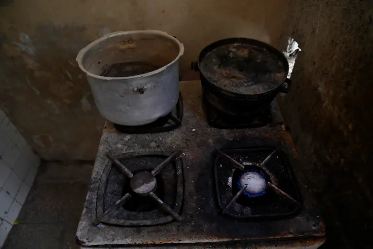 A-burner-on-the-stove-of-Sagrado-Armando-Garcia-85-a-retired-government-bureaucrat-remains-lit-because-he-does-not-have-a-lighter-in-Havana-Cuba-April-28-2026-Cuba-has-struggled-for-years-under-U-S-sanctions-to-provide-basic-services-Garcia-said-chronic-shortages-have-forced-him-to-improvise-in-daily-life-as-cooking-fuel-and-basic-supplies-run-short-They-are-leaving-us-to-our-fate-he-said-REUTERS-Norlys-Perez-SEARCH-NORLYS-CUBA-ELDERLY-FOR-THIS-STORY-SEARCH-WIDER-IMAGE-FOR-ALL-STORIES