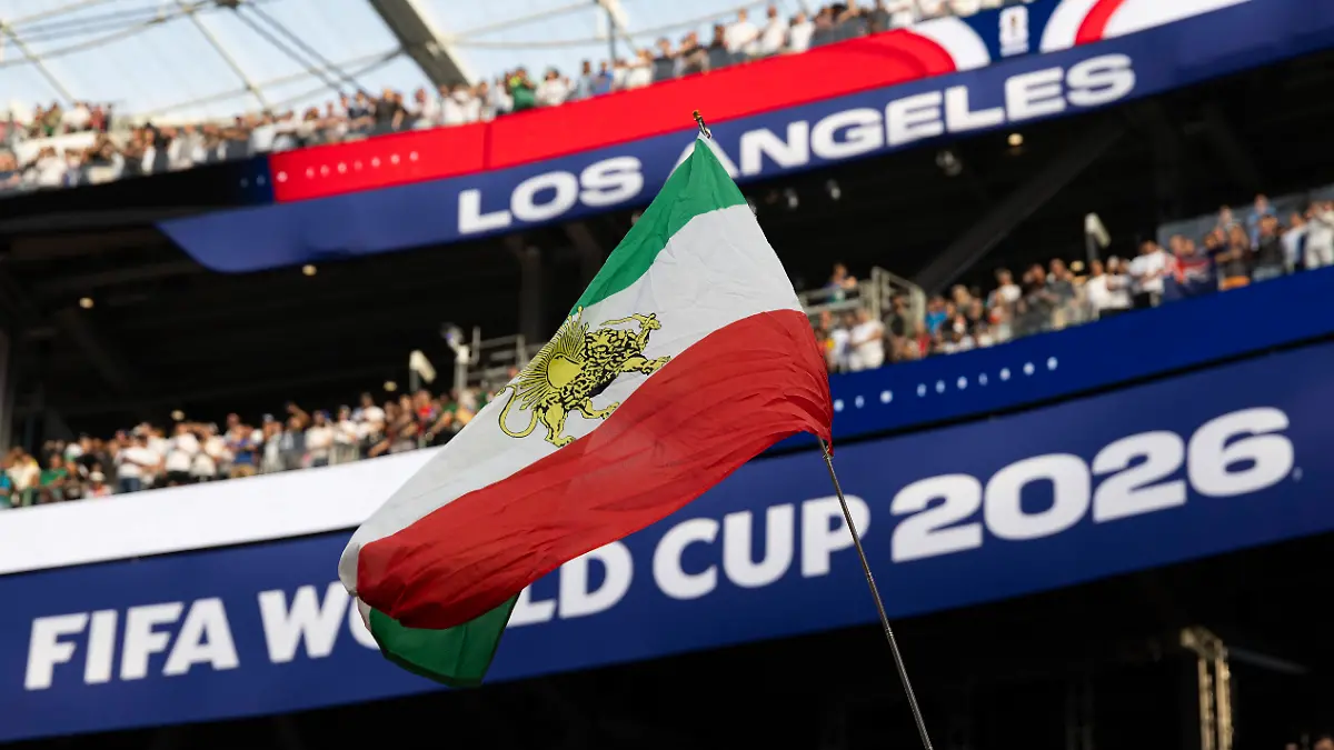 June-15-2026-Los-Angeles-California-USA-A-soccer-fan-waves-a-flag-during-the-FIFA-World-Cup-WM-Weltmeisterschaft-Fussball-Group-G-soccer-match-between-the-IR-Iran-and-the-New-Zealand-at-SoFi-Stadium-in-Inglewood-Calif-Monday-June-15-2026