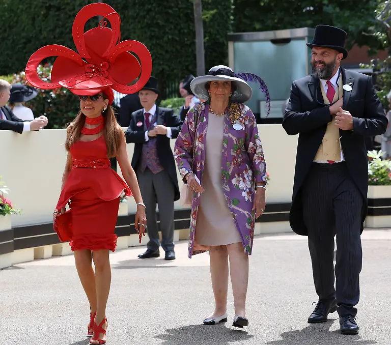 June-16-2026-Ascot-Berkshire-UK-Ascot-UK-A-lady-wears-a-large-red-hat-on-the-first-day-of-Royal-Ascot-in-Ascot-Berkshire-Royal-Ascot-is-a-historic-British-sporting-and-social-institution-running-from-Tuesday-16-Saturday-20-June-and-was-founded-by-Queen-Anne-in-1711