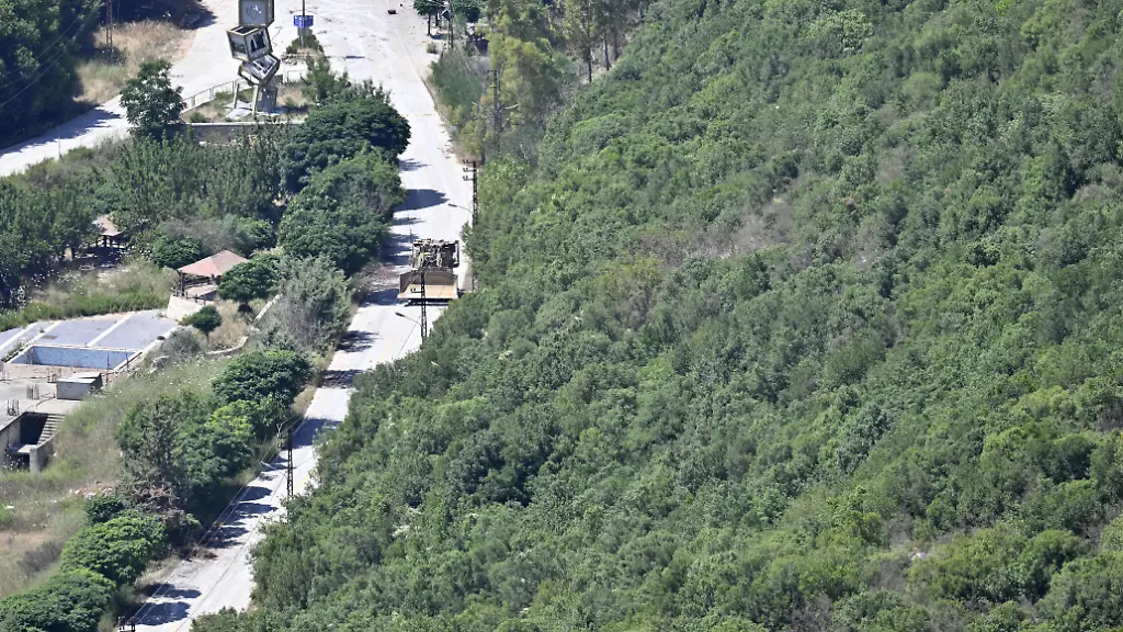NABATIEH-LEBANON-JUNE-16-An-Israeli-military-vehicle-is-stationed-in-the-Wadi-al-Hujair-region-in-Nabatieh-Lebanon-on-June-16-2026-Despite-the-recent-mutual-agreement-reached-between-the-United-States-and-Iran-Israeli-military-presence-continues-to-be-observed-in-the-area