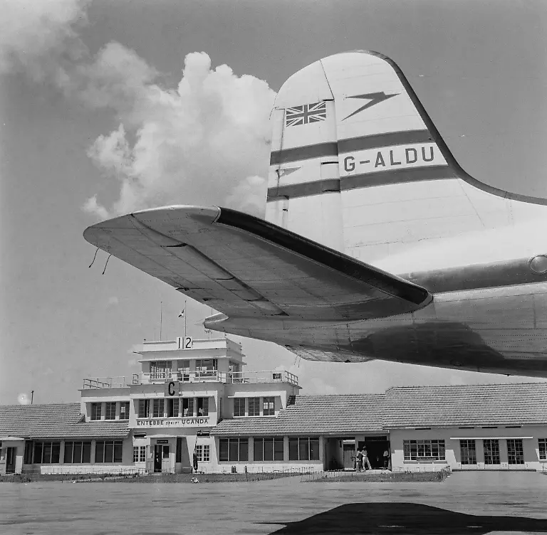 View-of-the-control-tower-and-terminal-buildings-at-Entebbe-Airport-Uganda-circa-July-1952-The-tail-of-a-Handley-Page-HP-81-Hermes-4-G-ALDU-is-shown-in-the-foreground-The-majority-of-the-British-Overseas-Airways-Corporation-s-BOAC-African-flights-landed-at-Entebbe