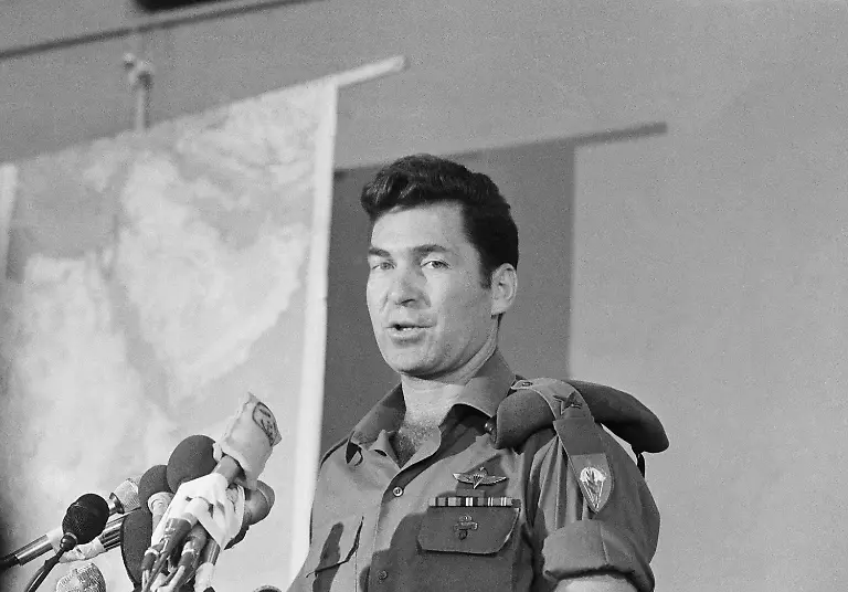 Israeli-Brigadier-Dan-Shomron-who-led-Sunday-s-commando-raid-into-Uganda-s-Entebbe-Airport-tells-newsmen-in-Tel-Aviv-how-he-and-his-men-rescued-hostages-who-were-held-for-a-week-by-pro-Palestine-hijackers-aboard-an-Air-France-plane-July-4-1976