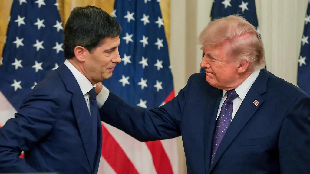 FILE-PHOTO-U-S-President-Donald-Trump-greets-the-new-Federal-Reserve-Chair-Kevin-Warsh-after-he-was-sworn-in-by-U-S-Supreme-Court-Justice-Clarence-Thomas-in-the-East-Room-at-the-White-House-in-Washington-D-C-U-S-May-22-2026