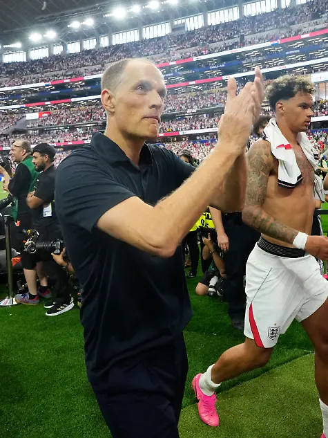 England-head-coach-Thomas-Tuchel-left-leaves-the-pitch-after-the-World-Cup-Group-L-soccer-match-between-England-and-Croatia-in-Arlington-Texas-near-Dallas-Wednesday-June-17-2026