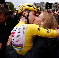 Slovenia-s-Tadej-Pogacar-the-Tour-de-France-winner-is-greeted-by-his-partner-Urska-Zigart-after-finishing-the-twenty-first-stage-of-the-Tour-de-France-cycling-race-over-132-3-kilometers-82-1-miles-with-start-in-Mantes-la-Ville-and-finish-on-the-Champs-Elysees-in-Paris-France-Sunday-July-27-2025