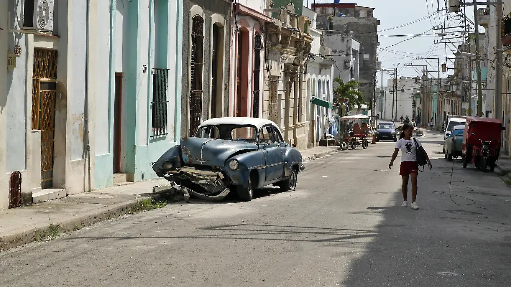 HAVANA-CUBA-JUNE-19-People-walk-in-a-street-of-Havana-Cuba-on-June-19-2026-Cuban-Prime-Minister-Manuel-Marrero-Cruz-presented-to-Parliament-last-Thursday-a-broad-program-of-market-reforms-unprecedented-in-Cuba-which-is-mired-in-a-deep-economic-and-energy-crisis-under-pressure-from-Washington