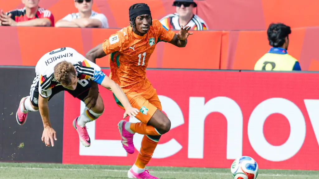 Yan-Diomande-of-Ivory-Coast-contests-with-Joshua-Kimmich-of-Germany-during-the-FIFA-World-Cup-WM-Weltmeisterschaft-Fussball-game-between-Germany-and-Ivory-Coast-at-Toronto-Stadium-on-June-20-2026-in-Toronto-Ontario-Canada-PUBLICATIONxNOTxINxBRAxMEX-Copyright-xCurtisxWongx-xSPPx-Sportspressphoto-SPR172020
