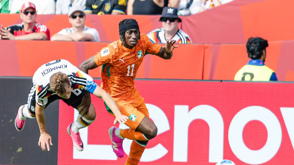 Yan-Diomande-of-Ivory-Coast-contests-with-Joshua-Kimmich-of-Germany-during-the-FIFA-World-Cup-WM-Weltmeisterschaft-Fussball-game-between-Germany-and-Ivory-Coast-at-Toronto-Stadium-on-June-20-2026-in-Toronto-Ontario-Canada-PUBLICATIONxNOTxINxBRAxMEX-Copyright-xCurtisxWongx-xSPPx-Sportspressphoto-SPR172020