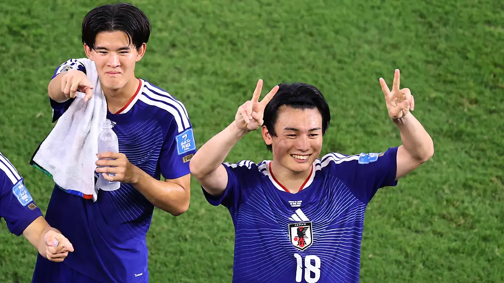 Soccer-Football-FIFA-World-Cup-2026-Group-F-Tunisia-v-Japan-Estadio-Monterrey-Monterrey-Mexico-June-21-2026-Japan-s-Ayase-Ueda-and-Keisuke-Goto-celebrate-after-the-match-REUTERS-Raquel-Cunha