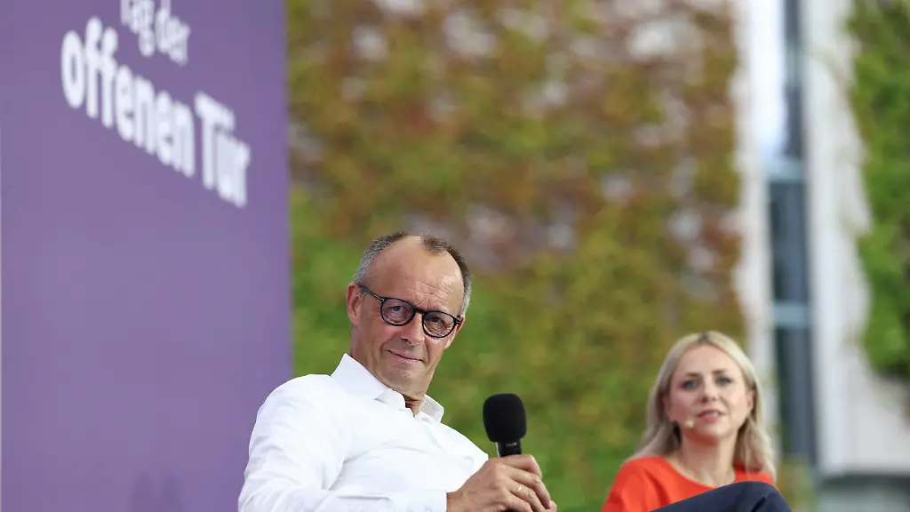German-Chancellor-Friedrich-Merz-looks-on-as-he-answers-questions-from-the-public-during-the-government-s-Open-House-at-the-chancellery-in-Berlin-Germany-June-21-2026