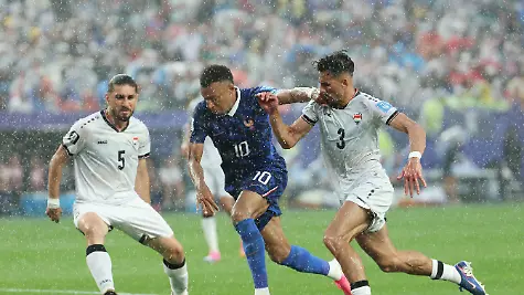 France-s-Kylian-Mbappe-center-drives-toward-goal-during-the-first-half-of-a-World-Cup-Group-I-soccer-match-against-Iraq-in-Philadelphia-Monday-June-22-2026-Mbappe-scored-twice-as-France-beat-Iraq-3-0-for-its-second-straight-win-in-Group-I