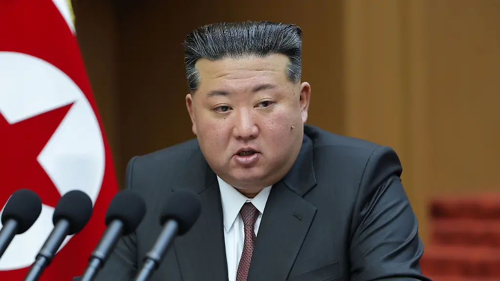 FILE-In-this-photo-provided-by-the-North-Korean-government-its-leader-Kim-Jong-Un-delivers-a-speech-during-a-session-of-the-Supreme-People-s-Assembly-at-parliament-in-Pyongyang-North-Korea-on-March-23-2026-Independent-journalists-were-not-given-access-to-cover-the-event-depicted-in-this-image-distributed-by-the-North-Korean-government-The-content-of-this-image-is-as-provided-and-cannot-be-independently-verified
