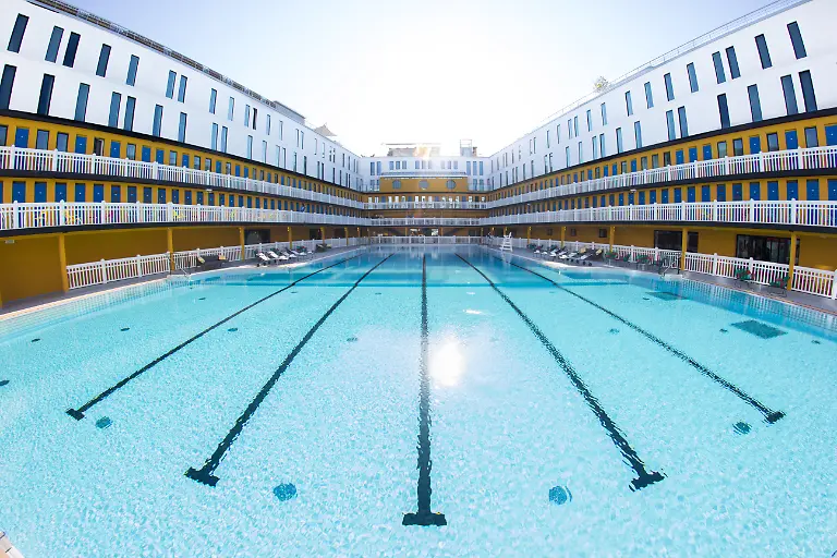 Atmosphere-at-the-Piscine-Molitor-swimming-pool-on-the-first-day-of-the-reopening-in-Paris-France-on-May-19-2014-The-famous-Parisian-Molitor-public-swimming-pool-which-was-closed-25-years-ago-and-left-in-direpair-and-covered-in-graffiti-has-been-renovated-and-is-now-part-of-a-private-resort-hotel-complex-Photo-by-Romain-Boe-ABACAPRESS