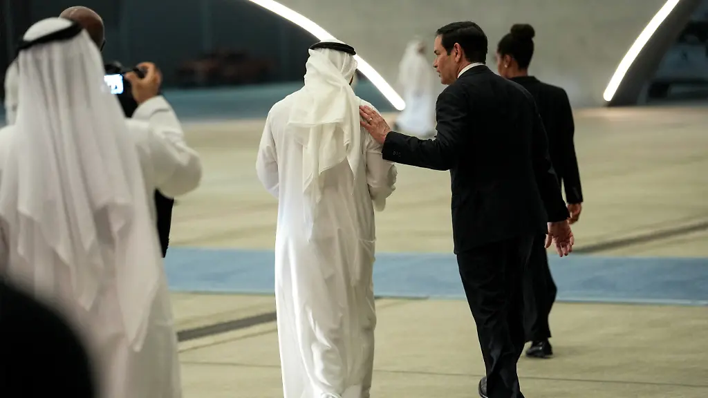 US-Secretary-of-State-Marco-Rubio-is-greeted-by-UAE-Ambassador-to-the-US-Yousef-al-Otaiba-upon-arrival-at-al-Bateen-Executive-Airport-in-Abu-Dhabi-on-June-23-2026-on-the-first-stop-of-a-tour-of-Gulf-states-aimed-at-showing-solidarity-with-key-allies-hit-hard-by-the-Middle-East-war-Rubio-s-delicate-mission-comes-with-Gulf-countries-having-paid-a-heavy-economic-price-for-the-US-and-Israel-s-decision-to-go-to-war-with-Iran-against-their-wishes-prompting-Tehran-to-lash-out-at-its-regional-neighbours