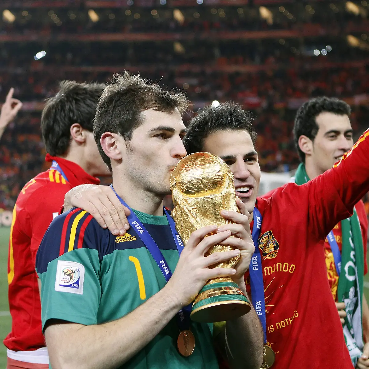 Netherlands-V-Spain-2010-FIFA-World-Cup-WM-Weltmeisterschaft-Fussball-Final-Iker-Casillas-of-Spain-and-Cesc-Fabregas-of-Spain-celebrate-with-World-Cup-Trophy-after-winning-the-2010-FIFA-World-Cup-Final-match-between-Netherlands-and-Spain-at-Soccer-City-on-July-11-2010-in-Johannesburg-South-Africa