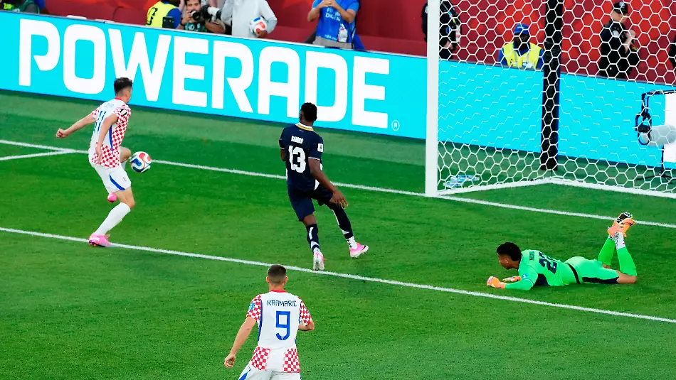 Croatia-s-Ante-Budimir-left-scores-on-Panama-goalkeeper-Orlando-Mosquera-22-as-Jiovany-Ramos-13-defends-during-the-second-half-of-a-World-Cup-Group-L-soccer-match-in-Toronto-on-Tuesday-June-23-2026