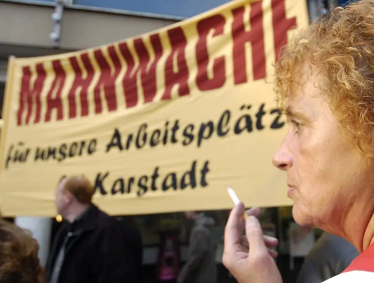 epa000293944-Employees-of-the-food-department-of-the-Karstadt-store-in-Mainz-stage-a-picket-on-Wednesday-13-October-2004-Many-employees-especially-those-who-work-at-smaller-Karstadt-stores-fear-that-their-stores-are-going-to-be-closed-down-and-that-they-will-lose-their-jobs-Karstadt-and-Quelle-heads-are-currently-discussing-their-reorganizations-plans-with-trade-unions-and-work-councils