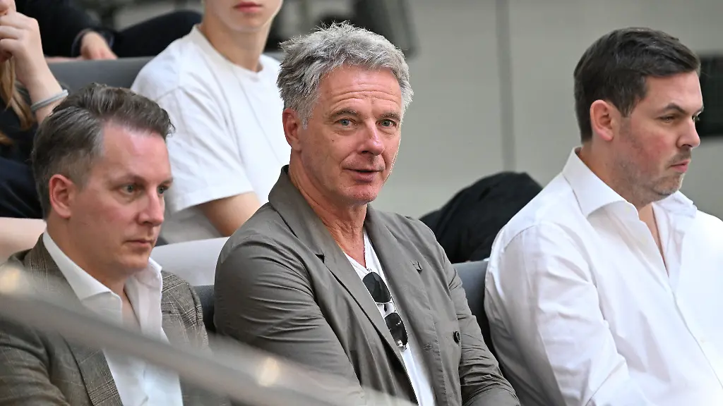 German-tv-host-Joerg-Pilawa-C-partner-of-the-President-of-the-German-Bundestag-lower-house-of-parliament-sits-on-the-visitors-tribune-and-attends-a-question-time-with-the-German-Chancellor-at-the-Bundestag-in-Berlin-Germany-on-June-24-2026