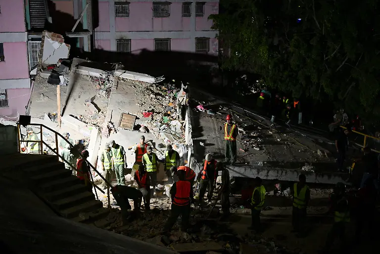 Emergency-services-work-at-the-site-of-a-collapsed-building-after-an-earthquake-in-Caracas-Venezuela-June-24-2026