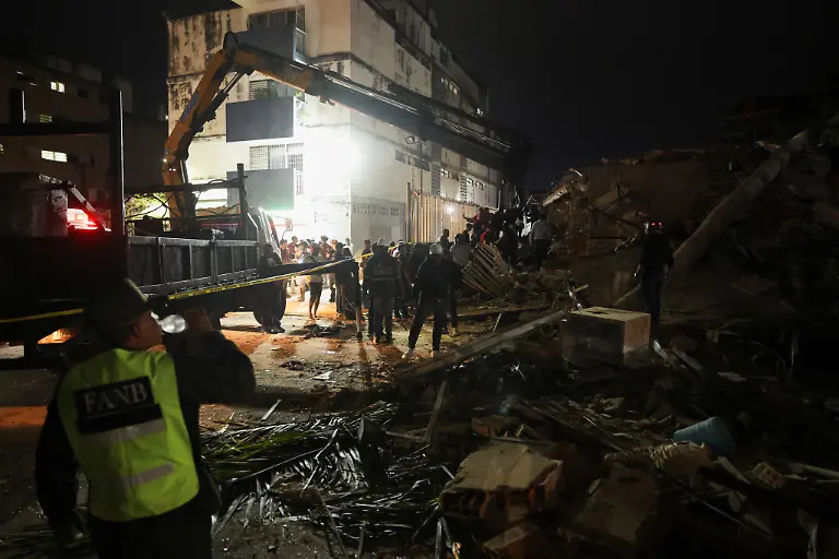 Emergency-services-work-at-the-site-of-a-collapsed-building-after-an-earthquake-in-Caracas-Venezuela-June-24-2026