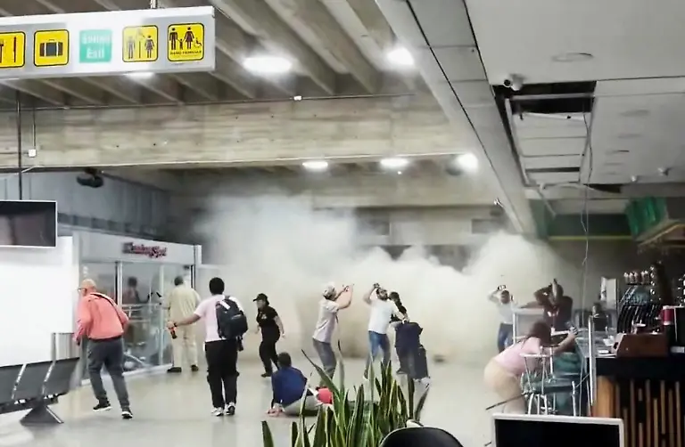 People-react-during-an-earthquake-at-Simon-Bolivar-International-Airport-in-Maiquetia-Venezuela-June-24-2026-in-this-still-image-obtained-from-a-social-media-video-Wilmer-Azuaje-via-REUTERS-THIS-IMAGE-HAS-BEEN-SUPPLIED-BY-A-THIRD-PARTY-MANDATORY-CREDIT-NO-RESALES-NO-ARCHIVES-THIS-PICTURE-WAS-PROCESSED-BY-REUTERS-TO-ENHANCE-QUALITY-AN-UNPROCESSED-VERSION-HAS-BEEN-PROVIDED-SEPARATELY-Verification-Lines-The-location-of-the-video-was-verified-by-the-ceiling-signage-and-floor-design-which-matched-archive-and-imagery-of-Simon-Bolivar-International-Airport-in-Maiquetia-Venezuela-The-video-was-filmed-at-the-coordinates-10-598665374102927-66-98241535277018-The-date-was-verified-by-a-USGS-report-of-two-earthquakes-that-hit-Venezuela-on-June-24-Venezuela-s-Interior-Ministry-said-buildings-and-houses-plummeted-after-the-earthquakes