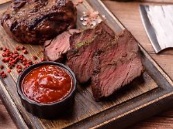 Rinderfiletsteak Blutig Mit Salz Und Gewuerzen Gegrillt Rindersteak Beef Mignon Steak Rare Meat Grilled With Salt And Spices Beef Steak As A Food Background For Your Design LicenseRF Copyright XZoonar